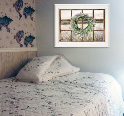 Country Gazing 3 White Framed Print Wall Art displayed above a bed, featuring a lavender wreath design.