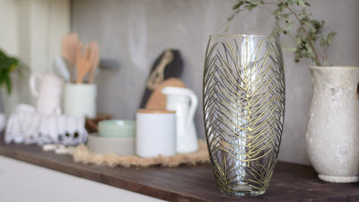 Hand Painted Glass Vase featuring nature-inspired design, displayed on a stylish home decor shelf.